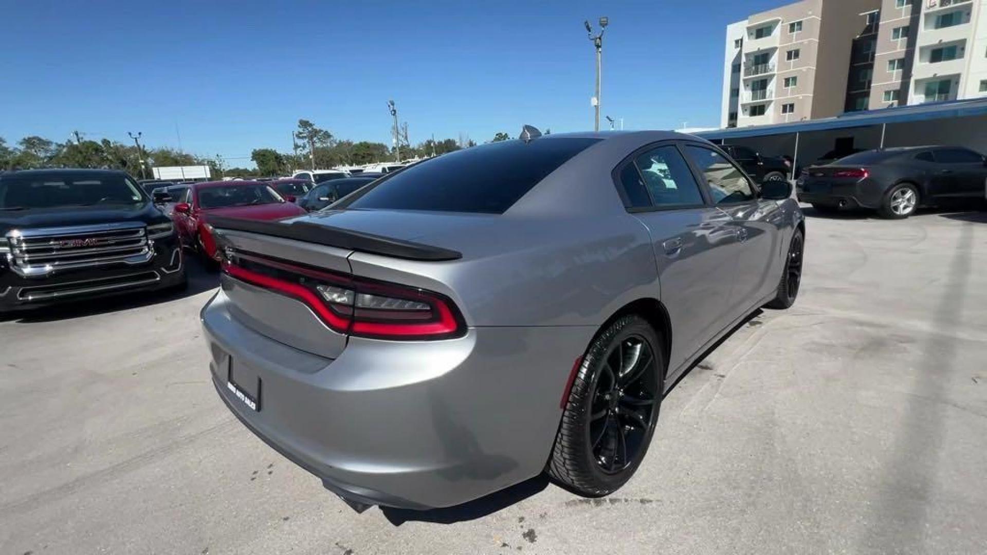 2016 Billet Silver Metallic Clearcoat /Black Dodge Charger SXT (2C3CDXHG4GH) with an 3.6L 6-Cylinder SMPI DOHC engine, Automatic transmission, located at 27610 S Dixie Hwy, Homestead, FL, 33032, (305) 749-2348, 25.510241, -80.438301 - Photo#4