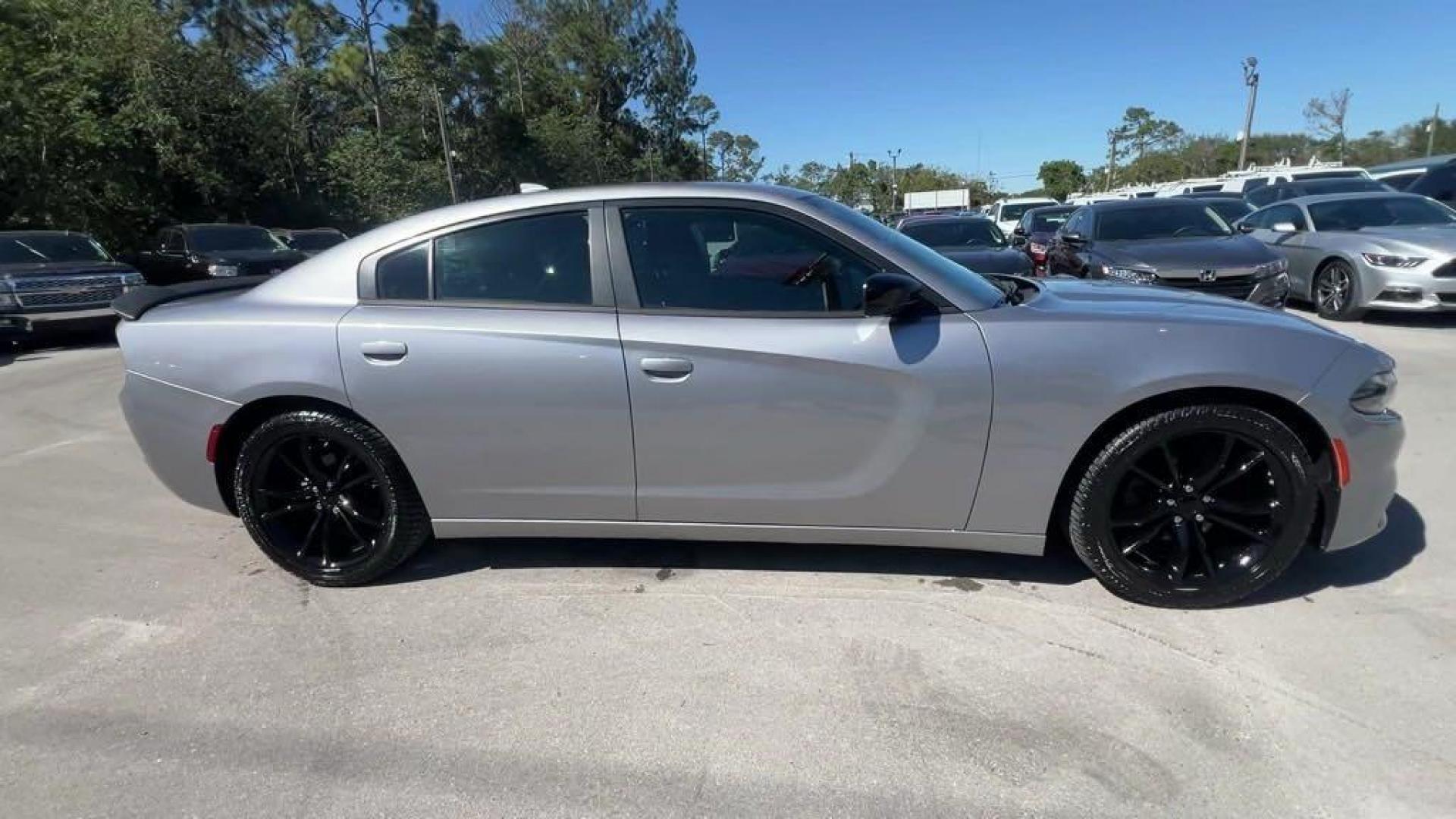 2016 Billet Silver Metallic Clearcoat /Black Dodge Charger SXT (2C3CDXHG4GH) with an 3.6L 6-Cylinder SMPI DOHC engine, Automatic transmission, located at 27610 S Dixie Hwy, Homestead, FL, 33032, (305) 749-2348, 25.510241, -80.438301 - Photo#5