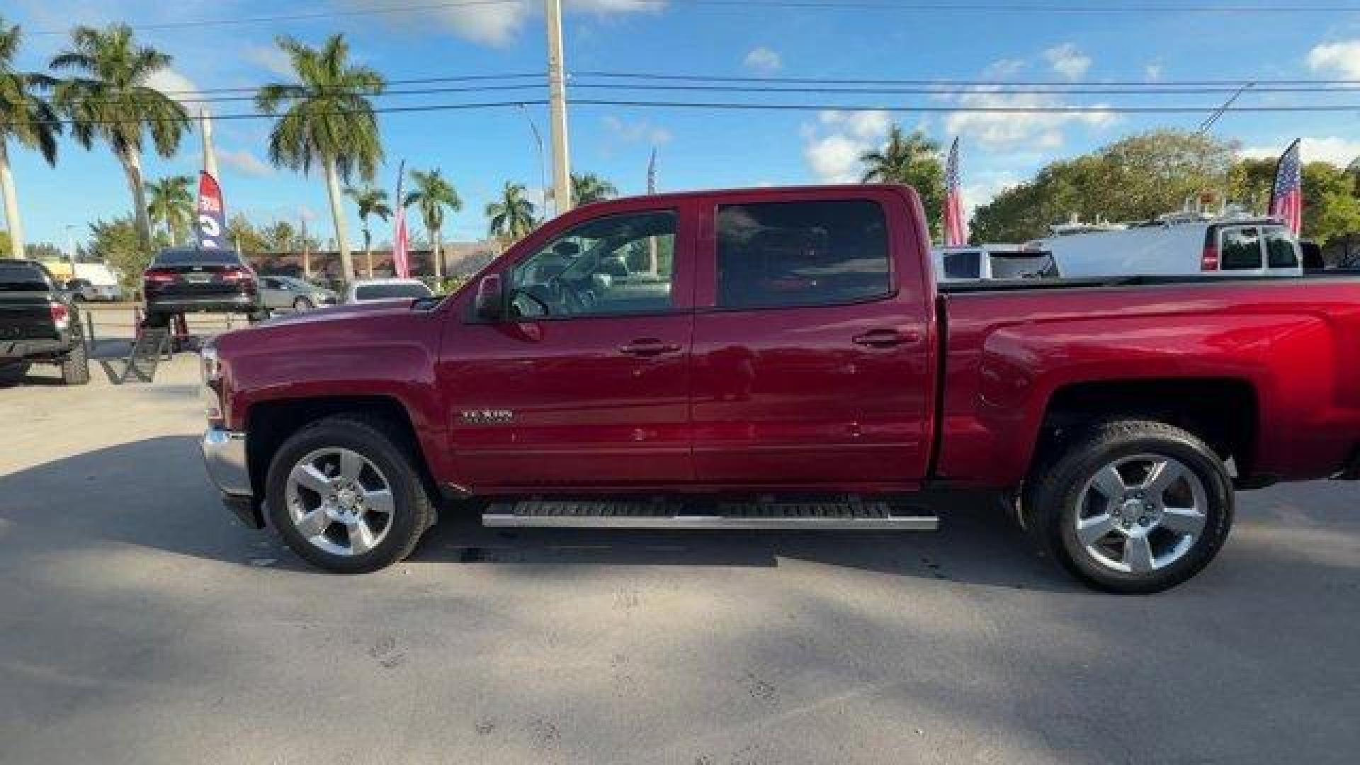 2018 Cajun Red Tintcoat /Jet Black Chevrolet Silverado 1500 LT (3GCPCREC2JG) with an 8 5.3L engine, Automatic transmission, located at 27610 S Dixie Hwy, Homestead, FL, 33032, (305) 749-2348, 25.510241, -80.438301 - KBB.com 10 Most Awarded Brands. Delivers 23 Highway MPG and 16 City MPG! This Chevrolet Silverado 1500 delivers a Gas V8 5.3L/325 engine powering this Automatic transmission. WHEELS, 20 X 9 (50.8 CM X 22.9 CM) POLISHED-ALUMINUM, TRANSMISSION, 6-SPEED AUTOMATIC, ELECTRONICALLY CONTROLLED with overdri - Photo#1