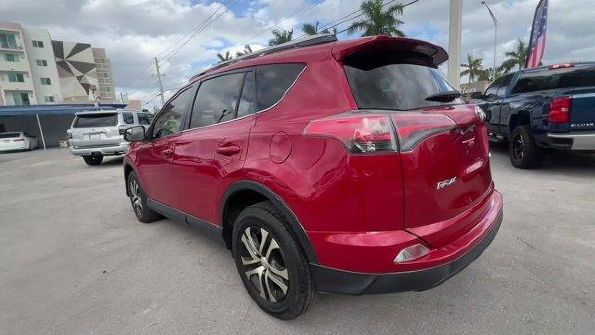 2016 Red Toyota RAV4 LE (JTMZFREV1GJ) with an 4 2.5 L engine, Automatic transmission, located at 27610 S Dixie Hwy, Homestead, FL, 33032, (305) 749-2348, 25.510241, -80.438301 - IIHS Top Safety Pick+. Scores 30 Highway MPG and 23 City MPG! This Toyota RAV4 delivers a Regular Unleaded I-4 2.5 L/152 engine powering this Automatic transmission. Wheels: 17 x 6.5J -inc: caps, Urethane Gear Shifter Material, Trip Computer.*This Toyota RAV4 Comes Equipped with These Options *Trans - Photo#2