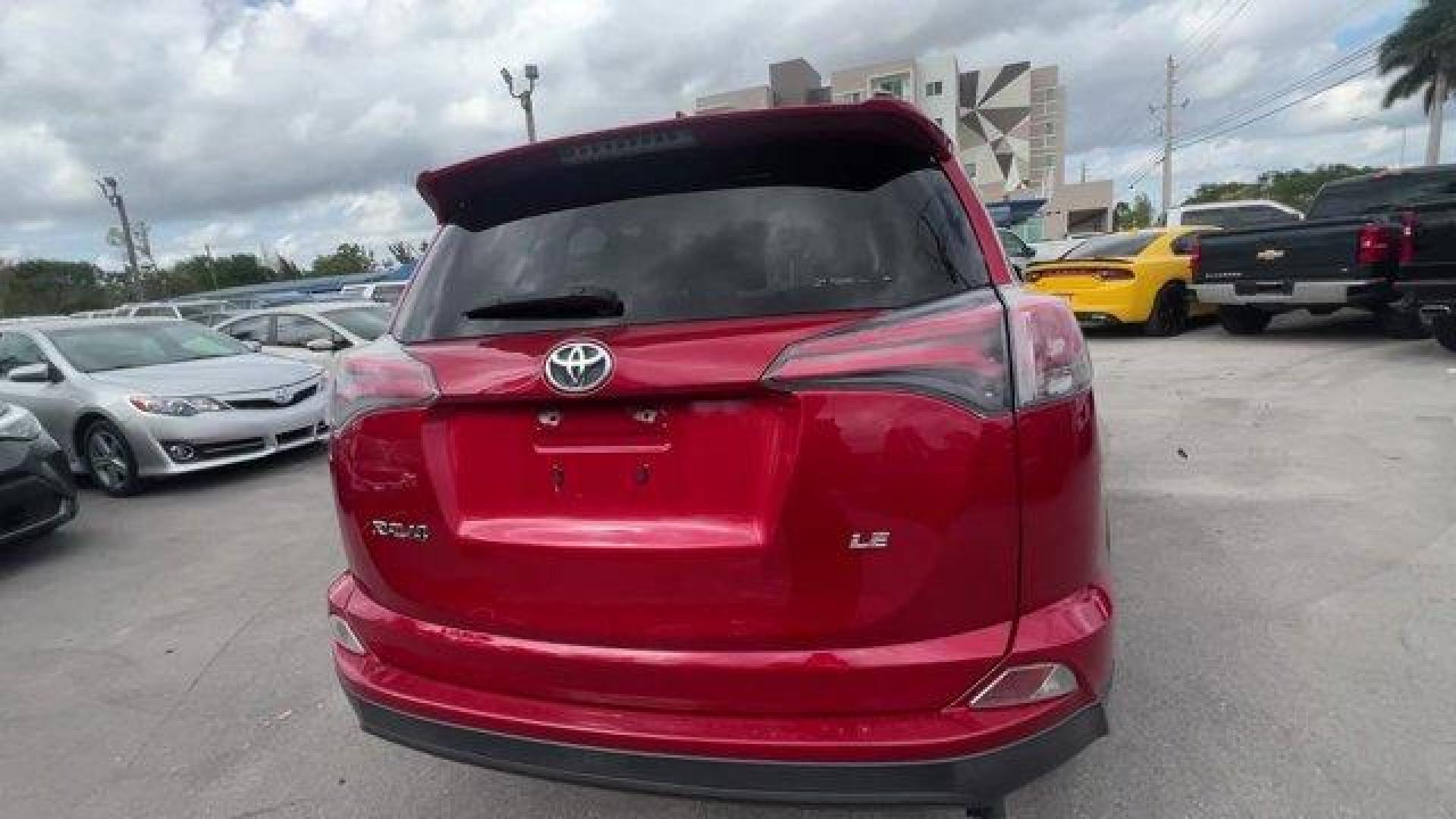 2016 Red Toyota RAV4 LE (JTMZFREV1GJ) with an 4 2.5 L engine, Automatic transmission, located at 27610 S Dixie Hwy, Homestead, FL, 33032, (305) 749-2348, 25.510241, -80.438301 - IIHS Top Safety Pick+. Scores 30 Highway MPG and 23 City MPG! This Toyota RAV4 delivers a Regular Unleaded I-4 2.5 L/152 engine powering this Automatic transmission. Wheels: 17 x 6.5J -inc: caps, Urethane Gear Shifter Material, Trip Computer.*This Toyota RAV4 Comes Equipped with These Options *Trans - Photo#3