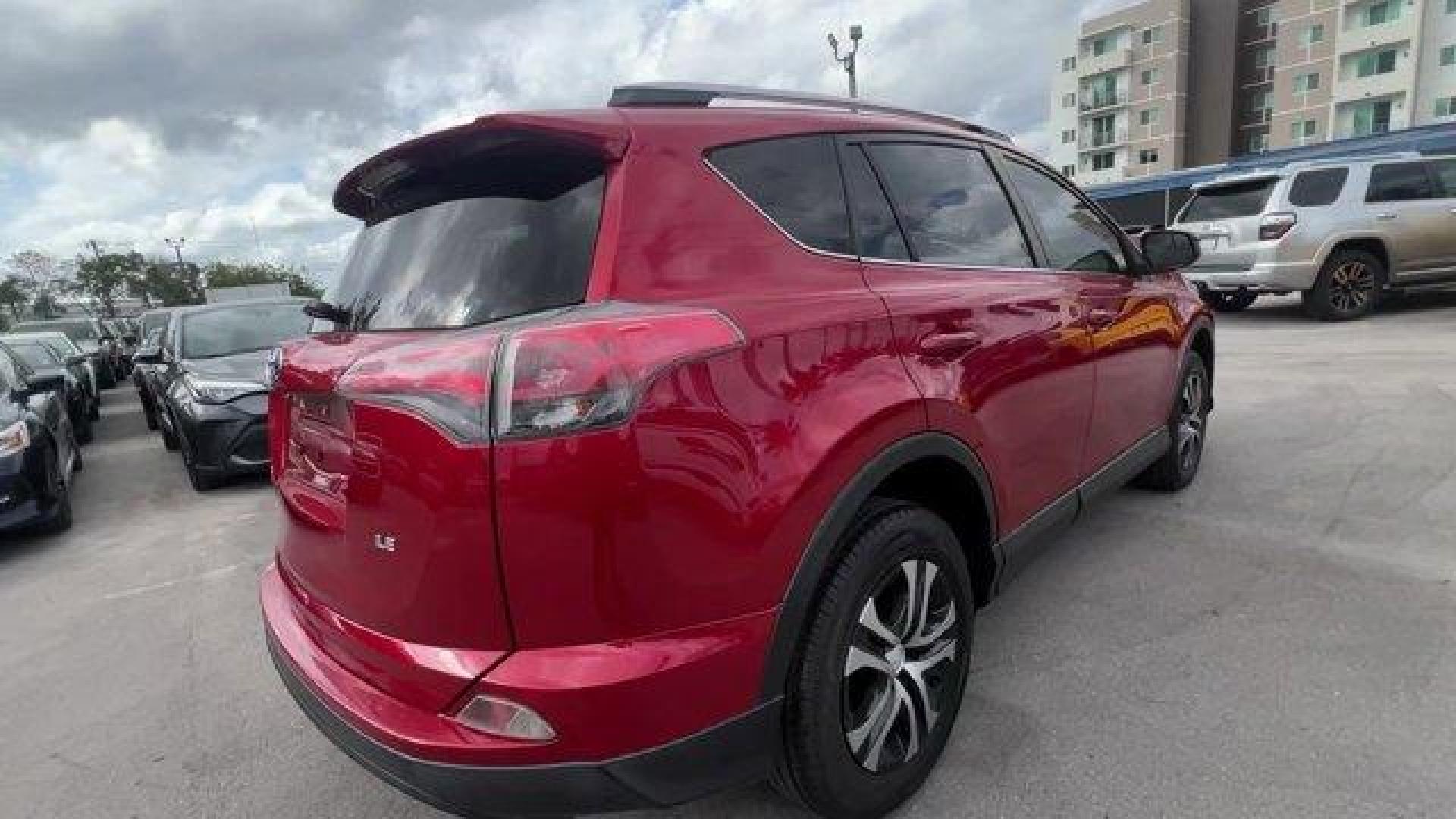 2016 Red Toyota RAV4 LE (JTMZFREV1GJ) with an 4 2.5 L engine, Automatic transmission, located at 27610 S Dixie Hwy, Homestead, FL, 33032, (305) 749-2348, 25.510241, -80.438301 - IIHS Top Safety Pick+. Scores 30 Highway MPG and 23 City MPG! This Toyota RAV4 delivers a Regular Unleaded I-4 2.5 L/152 engine powering this Automatic transmission. Wheels: 17 x 6.5J -inc: caps, Urethane Gear Shifter Material, Trip Computer.*This Toyota RAV4 Comes Equipped with These Options *Trans - Photo#4