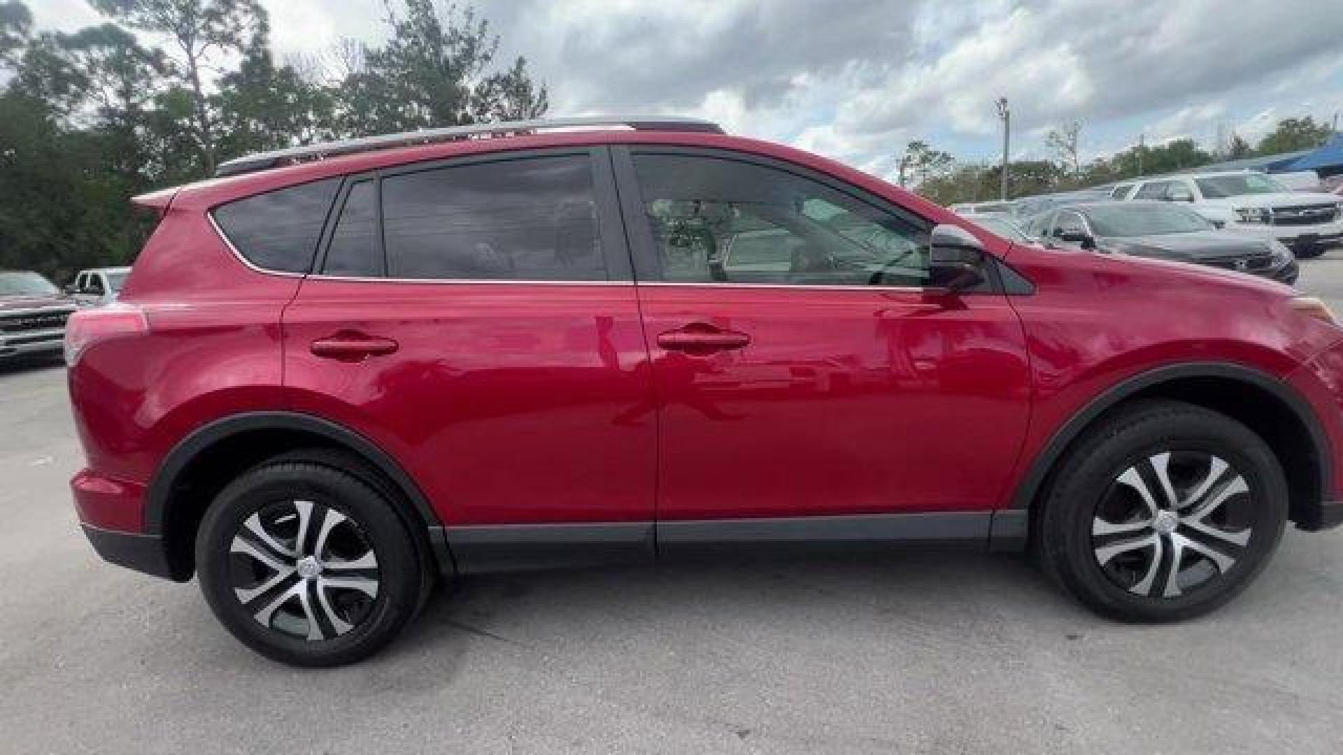 2016 Red Toyota RAV4 LE (JTMZFREV1GJ) with an 4 2.5 L engine, Automatic transmission, located at 27610 S Dixie Hwy, Homestead, FL, 33032, (305) 749-2348, 25.510241, -80.438301 - IIHS Top Safety Pick+. Scores 30 Highway MPG and 23 City MPG! This Toyota RAV4 delivers a Regular Unleaded I-4 2.5 L/152 engine powering this Automatic transmission. Wheels: 17 x 6.5J -inc: caps, Urethane Gear Shifter Material, Trip Computer.*This Toyota RAV4 Comes Equipped with These Options *Trans - Photo#5
