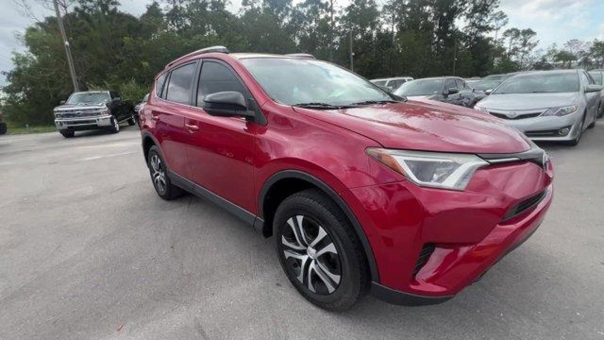 2016 Red Toyota RAV4 LE (JTMZFREV1GJ) with an 4 2.5 L engine, Automatic transmission, located at 27610 S Dixie Hwy, Homestead, FL, 33032, (305) 749-2348, 25.510241, -80.438301 - IIHS Top Safety Pick+. Scores 30 Highway MPG and 23 City MPG! This Toyota RAV4 delivers a Regular Unleaded I-4 2.5 L/152 engine powering this Automatic transmission. Wheels: 17 x 6.5J -inc: caps, Urethane Gear Shifter Material, Trip Computer.*This Toyota RAV4 Comes Equipped with These Options *Trans - Photo#6