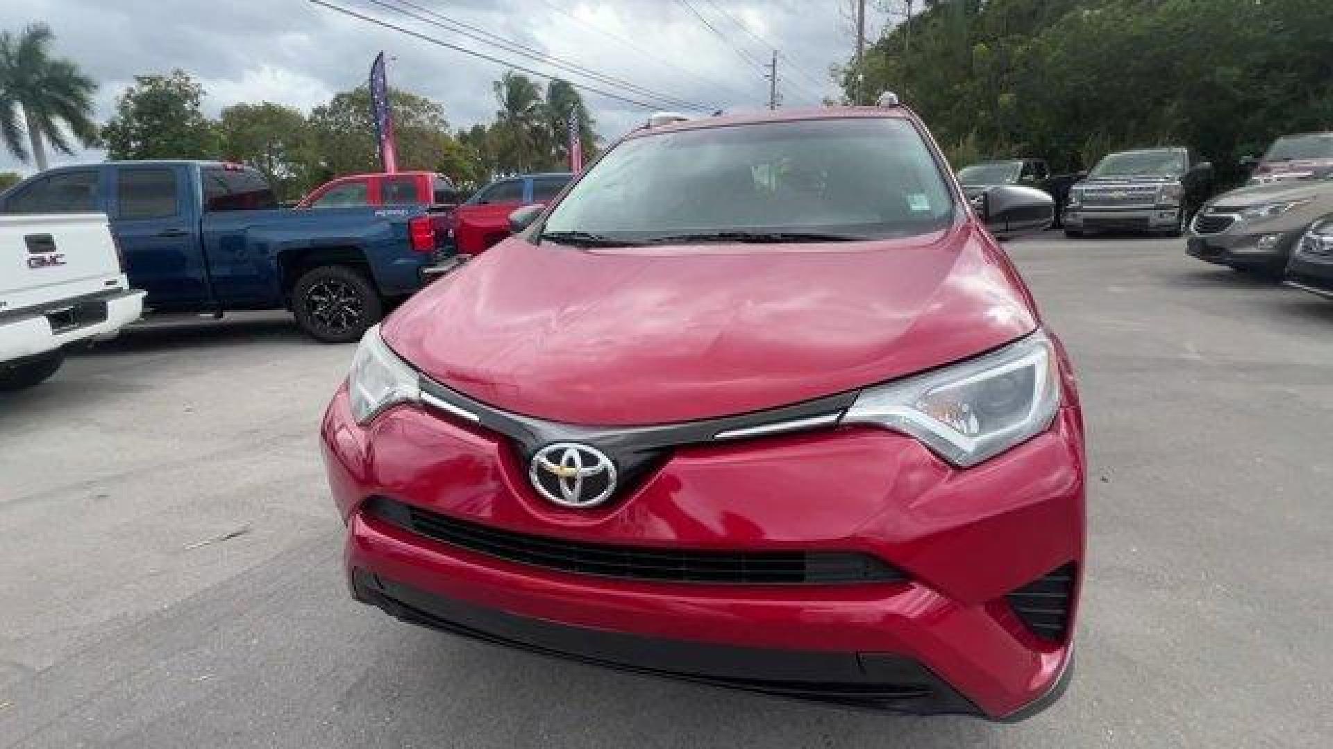 2016 Red Toyota RAV4 LE (JTMZFREV1GJ) with an 4 2.5 L engine, Automatic transmission, located at 27610 S Dixie Hwy, Homestead, FL, 33032, (305) 749-2348, 25.510241, -80.438301 - IIHS Top Safety Pick+. Scores 30 Highway MPG and 23 City MPG! This Toyota RAV4 delivers a Regular Unleaded I-4 2.5 L/152 engine powering this Automatic transmission. Wheels: 17 x 6.5J -inc: caps, Urethane Gear Shifter Material, Trip Computer.*This Toyota RAV4 Comes Equipped with These Options *Trans - Photo#7
