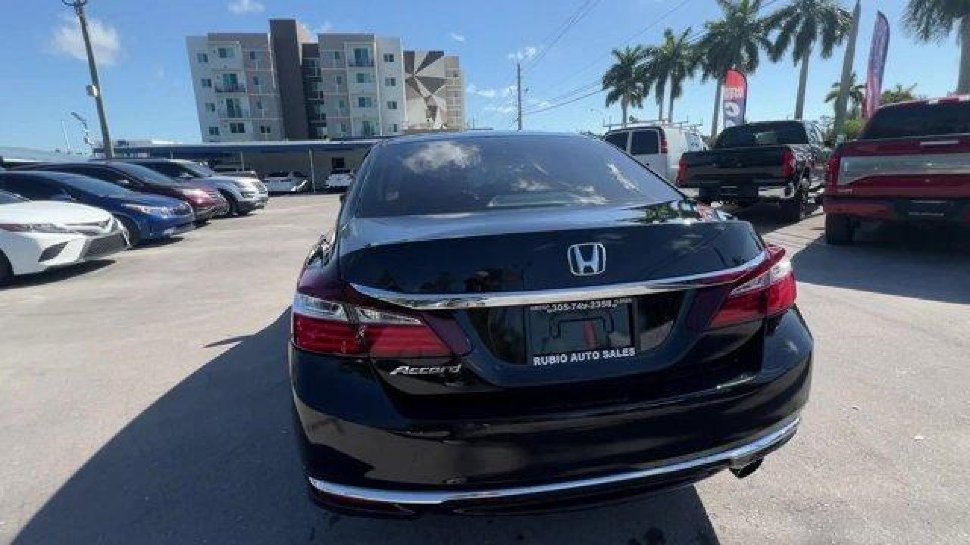 2016 Black Honda Accord Sedan LX (1HGCR2F32GA) with an 4 2.4 L engine, Variable transmission, located at 27610 S Dixie Hwy, Homestead, FL, 33032, (305) 749-2348, 25.510241, -80.438301 - KBB.com Brand Image Awards. Scores 37 Highway MPG and 27 City MPG! This Honda Accord Sedan delivers a Regular Unleaded I-4 2.4 L/144 engine powering this Variable transmission. Window Grid Antenna, Wheels: 16 Alloy, VSA Electronic Stability Control (ESC).* This Honda Accord Sedan Features the Follow - Photo#3