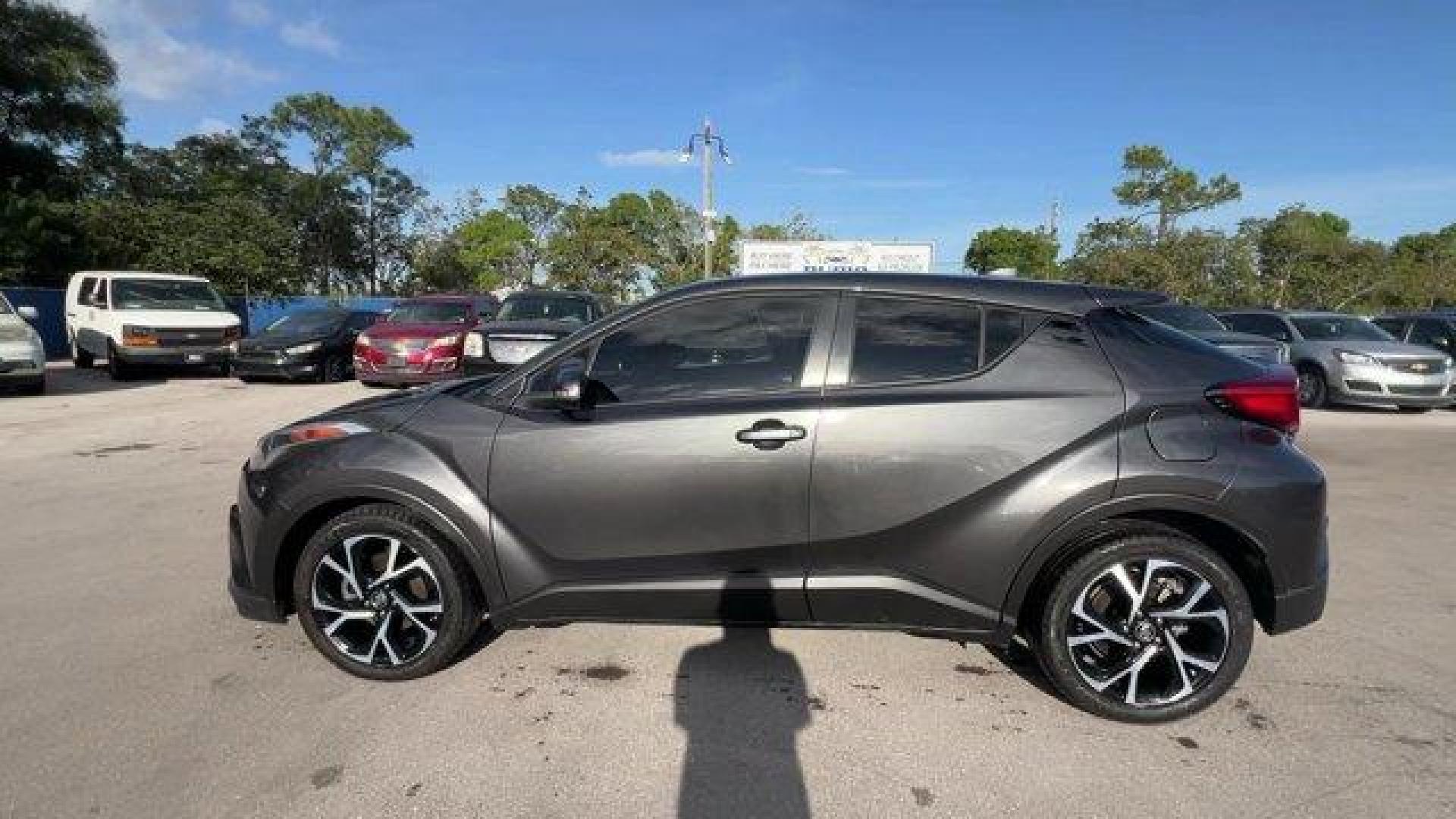 2019 Gray Toyota C-HR (NMTKHMBX1KR) with an 4 2.0 L engine, Variable transmission, located at 27610 S Dixie Hwy, Homestead, FL, 33032, (305) 749-2348, 25.510241, -80.438301 - KBB.com Best Resale Value Awards. Delivers 31 Highway MPG and 27 City MPG! This Toyota C-HR delivers a Regular Unleaded I-4 2.0 L/121 engine powering this Variable transmission. Wing Spoiler, VSC Electronic Stability Control (ESC), Variable Intermittent Wipers.*This Toyota C-HR Comes Equipped with T - Photo#4