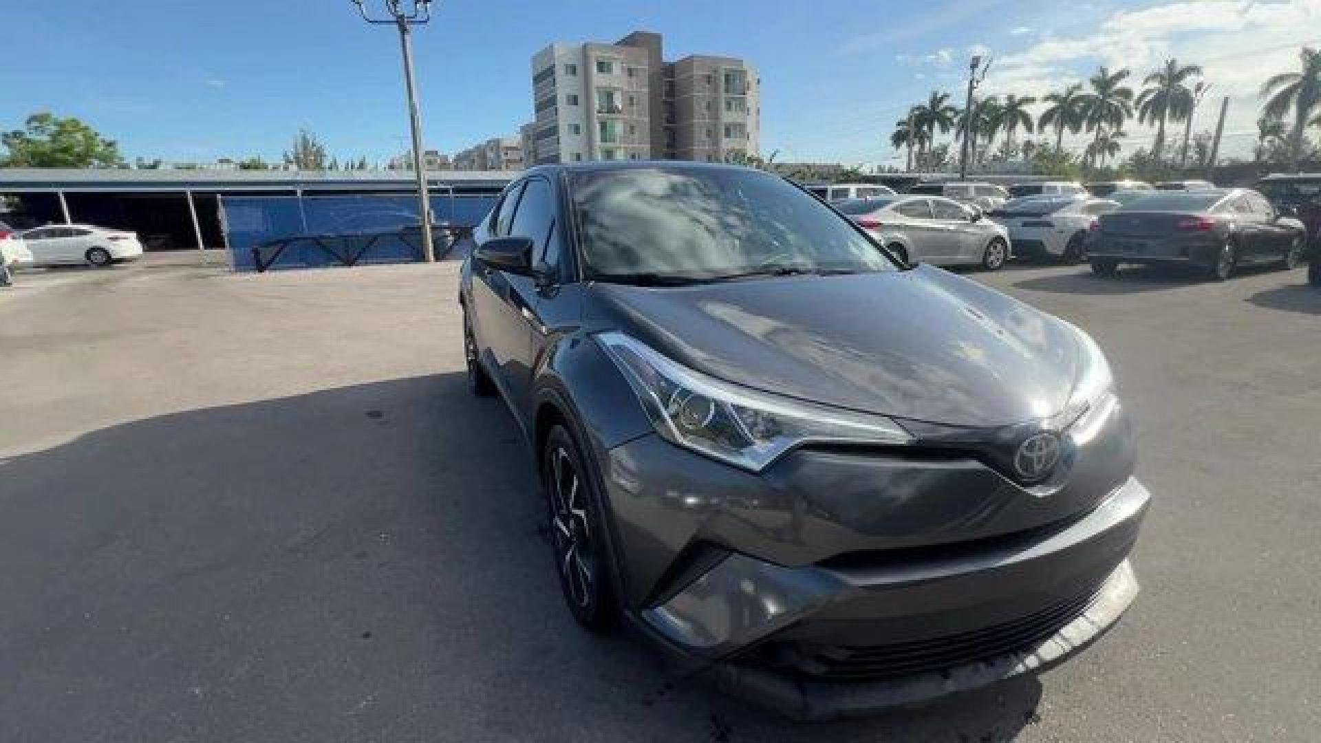 2019 Gray Toyota C-HR (NMTKHMBX1KR) with an 4 2.0 L engine, Variable transmission, located at 27610 S Dixie Hwy, Homestead, FL, 33032, (305) 749-2348, 25.510241, -80.438301 - KBB.com Best Resale Value Awards. Delivers 31 Highway MPG and 27 City MPG! This Toyota C-HR delivers a Regular Unleaded I-4 2.0 L/121 engine powering this Variable transmission. Wing Spoiler, VSC Electronic Stability Control (ESC), Variable Intermittent Wipers.*This Toyota C-HR Comes Equipped with T - Photo#5