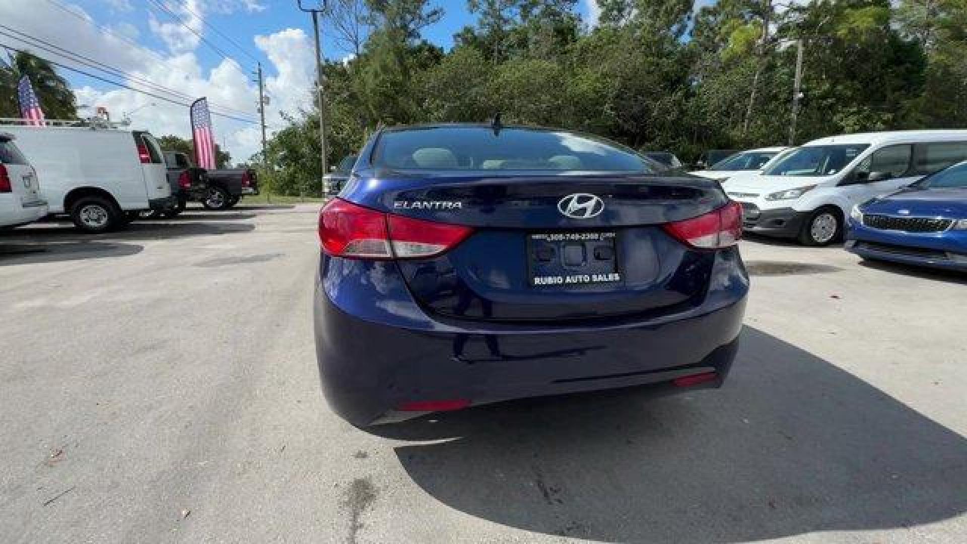 2013 Indigo Blue Pearl /Gray Hyundai Elantra GLS (5NPDH4AE4DH) with an 4 1.8L engine, Automatic transmission, located at 27610 S Dixie Hwy, Homestead, FL, 33032, (305) 749-2348, 25.510241, -80.438301 - IIHS Top Safety Pick. Delivers 38 Highway MPG and 28 City MPG! This Hyundai Elantra boasts a Gas I4 1.8L/110 engine powering this Automatic transmission. STANDARD EQUIPMENT PKG, INDIGO BLUE PEARL, GRAY, CLOTH SEAT TRIM.* This Hyundai Elantra Features the Following Options *AUTO-DIMMING REARVIEW MIRR - Photo#3