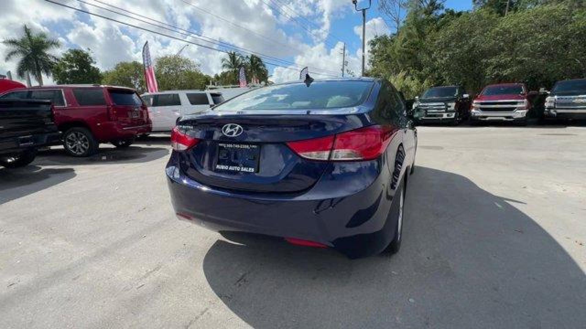 2013 Indigo Blue Pearl /Gray Hyundai Elantra GLS (5NPDH4AE4DH) with an 4 1.8L engine, Automatic transmission, located at 27610 S Dixie Hwy, Homestead, FL, 33032, (305) 749-2348, 25.510241, -80.438301 - IIHS Top Safety Pick. Delivers 38 Highway MPG and 28 City MPG! This Hyundai Elantra boasts a Gas I4 1.8L/110 engine powering this Automatic transmission. STANDARD EQUIPMENT PKG, INDIGO BLUE PEARL, GRAY, CLOTH SEAT TRIM.* This Hyundai Elantra Features the Following Options *AUTO-DIMMING REARVIEW MIRR - Photo#4