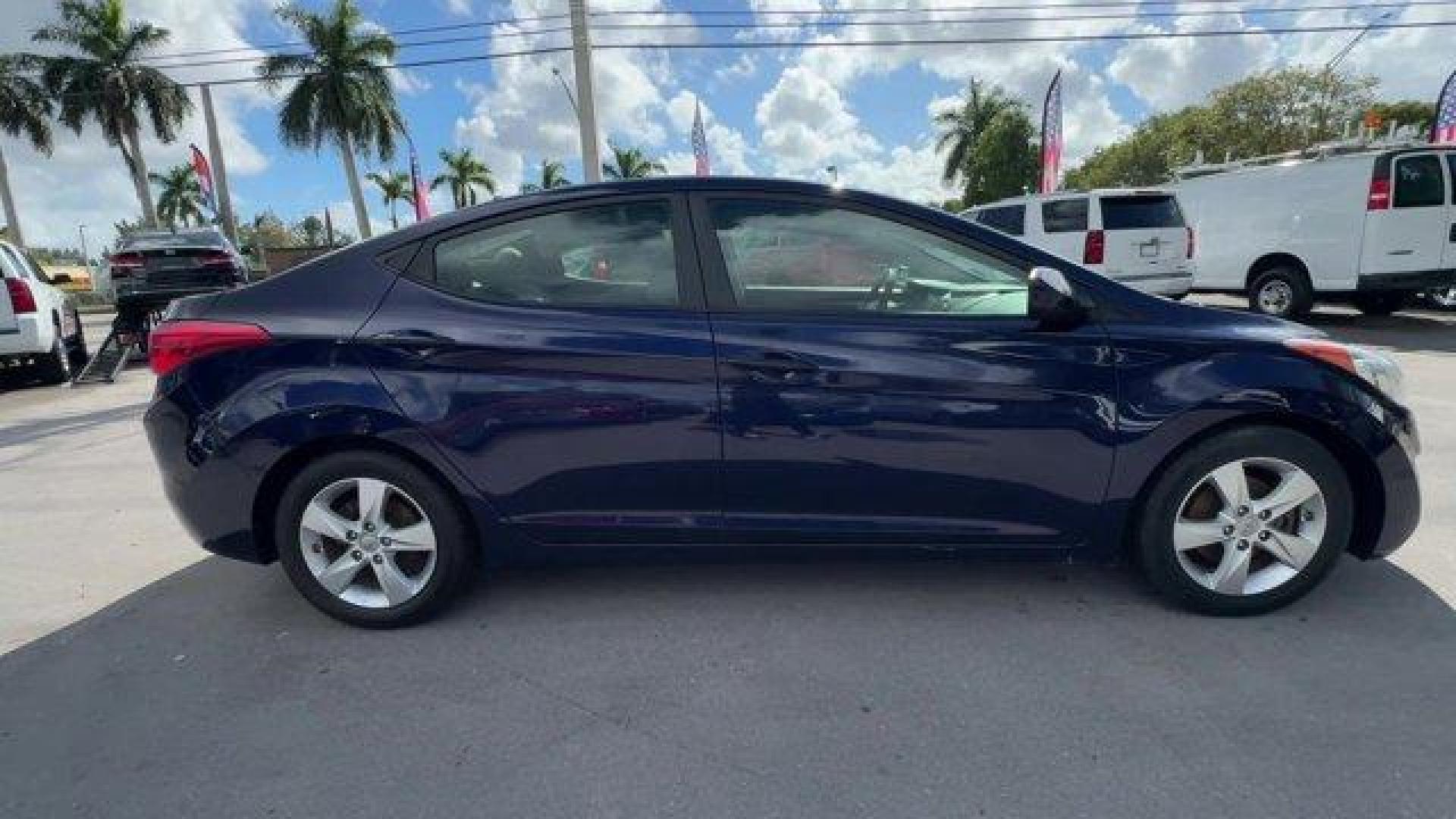 2013 Indigo Blue Pearl /Gray Hyundai Elantra GLS (5NPDH4AE4DH) with an 4 1.8L engine, Automatic transmission, located at 27610 S Dixie Hwy, Homestead, FL, 33032, (305) 749-2348, 25.510241, -80.438301 - IIHS Top Safety Pick. Delivers 38 Highway MPG and 28 City MPG! This Hyundai Elantra boasts a Gas I4 1.8L/110 engine powering this Automatic transmission. STANDARD EQUIPMENT PKG, INDIGO BLUE PEARL, GRAY, CLOTH SEAT TRIM.* This Hyundai Elantra Features the Following Options *AUTO-DIMMING REARVIEW MIRR - Photo#5