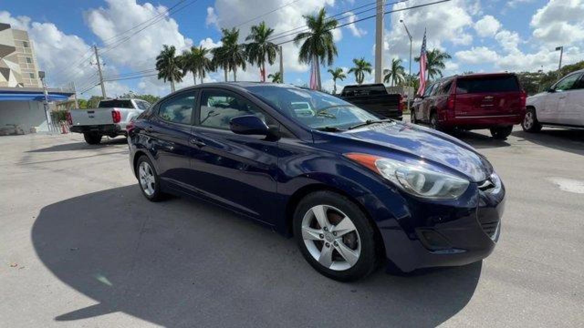 2013 Indigo Blue Pearl /Gray Hyundai Elantra GLS (5NPDH4AE4DH) with an 4 1.8L engine, Automatic transmission, located at 27610 S Dixie Hwy, Homestead, FL, 33032, (305) 749-2348, 25.510241, -80.438301 - IIHS Top Safety Pick. Delivers 38 Highway MPG and 28 City MPG! This Hyundai Elantra boasts a Gas I4 1.8L/110 engine powering this Automatic transmission. STANDARD EQUIPMENT PKG, INDIGO BLUE PEARL, GRAY, CLOTH SEAT TRIM.* This Hyundai Elantra Features the Following Options *AUTO-DIMMING REARVIEW MIRR - Photo#6