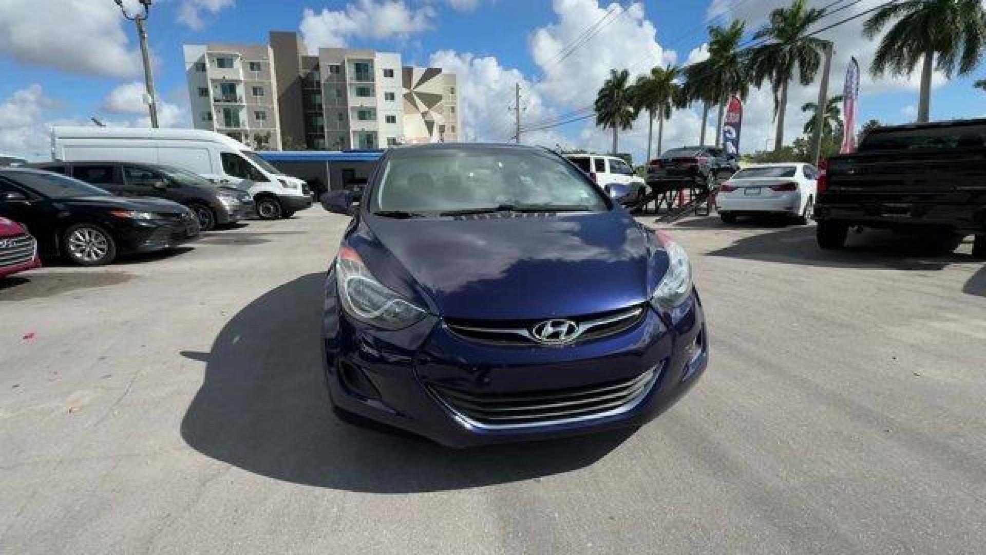 2013 Indigo Blue Pearl /Gray Hyundai Elantra GLS (5NPDH4AE4DH) with an 4 1.8L engine, Automatic transmission, located at 27610 S Dixie Hwy, Homestead, FL, 33032, (305) 749-2348, 25.510241, -80.438301 - IIHS Top Safety Pick. Delivers 38 Highway MPG and 28 City MPG! This Hyundai Elantra boasts a Gas I4 1.8L/110 engine powering this Automatic transmission. STANDARD EQUIPMENT PKG, INDIGO BLUE PEARL, GRAY, CLOTH SEAT TRIM.* This Hyundai Elantra Features the Following Options *AUTO-DIMMING REARVIEW MIRR - Photo#7