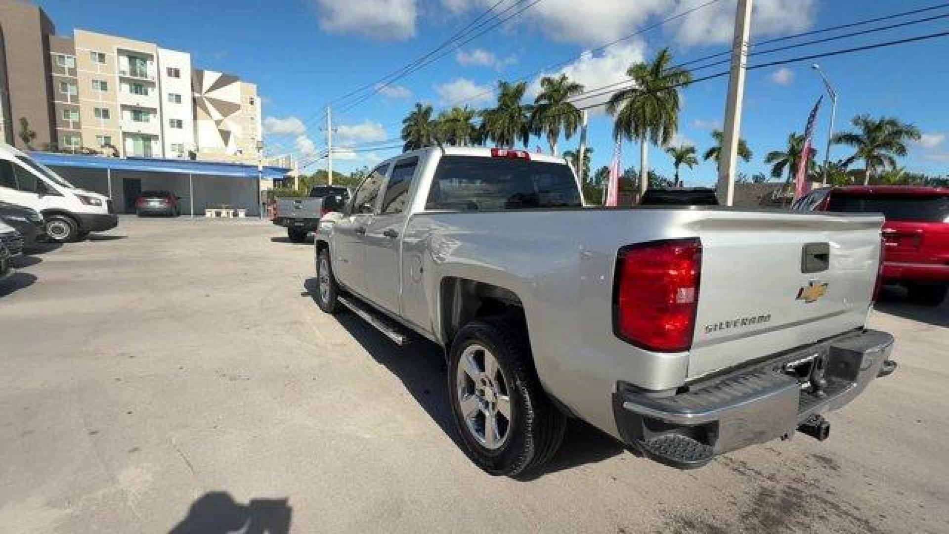 2014 Silver Ice Metallic /Jet Black/Dark Ash Chevrolet Silverado 1500 Work Truck (1GCRCPEH7EZ) with an 6 4.3L engine, Automatic transmission, located at 27610 S Dixie Hwy, Homestead, FL, 33032, (305) 749-2348, 25.510241, -80.438301 - NACTOY 2014 North American Truck of the Year. Boasts 24 Highway MPG and 18 City MPG! This Chevrolet Silverado 1500 delivers a Gas/Ethanol V6 4.3L/262 engine powering this Automatic transmission. TRANSMISSION, 6-SPEED AUTOMATIC, ELECTRONICALLY CONTROLLED with overdrive and tow/haul mode. Includes Cru - Photo#2