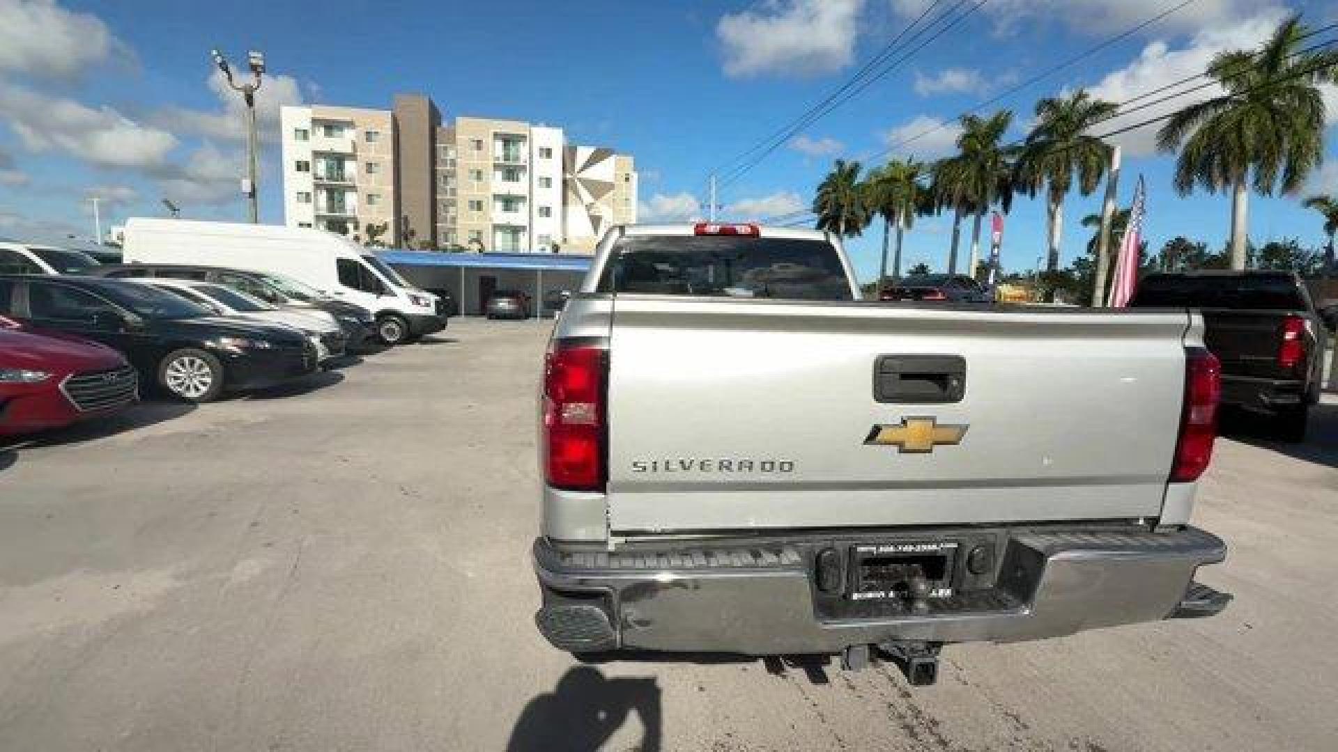 2014 Silver Ice Metallic /Jet Black/Dark Ash Chevrolet Silverado 1500 Work Truck (1GCRCPEH7EZ) with an 6 4.3L engine, Automatic transmission, located at 27610 S Dixie Hwy, Homestead, FL, 33032, (305) 749-2348, 25.510241, -80.438301 - NACTOY 2014 North American Truck of the Year. Boasts 24 Highway MPG and 18 City MPG! This Chevrolet Silverado 1500 delivers a Gas/Ethanol V6 4.3L/262 engine powering this Automatic transmission. TRANSMISSION, 6-SPEED AUTOMATIC, ELECTRONICALLY CONTROLLED with overdrive and tow/haul mode. Includes Cru - Photo#3