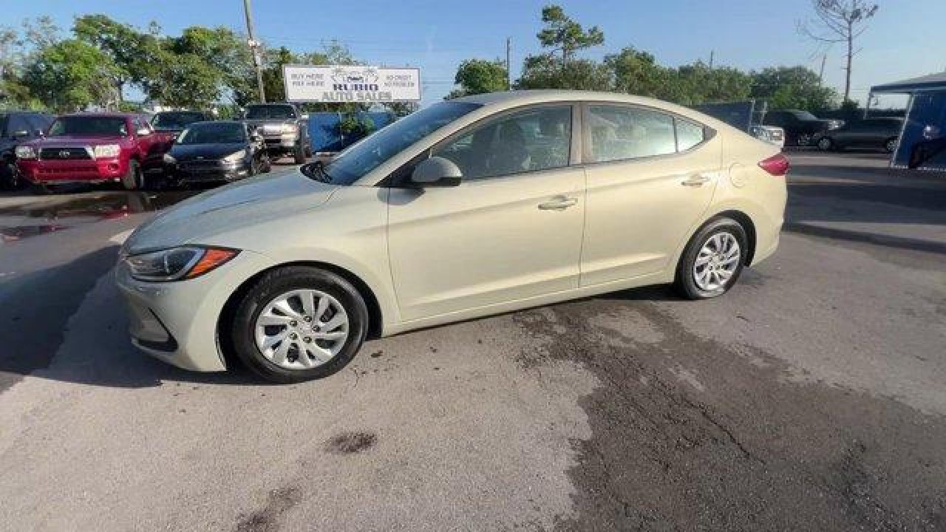 2017 Mineral Beige Pearl /Beige Hyundai Elantra SE (KMHD74LF2HU) with an 4 2.0 L engine, Automatic transmission, located at 27610 S Dixie Hwy, Homestead, FL, 33032, (305) 749-2348, 25.510241, -80.438301 - IIHS Top Safety Pick+, Top Safety Pick+. Delivers 38 Highway MPG and 29 City MPG! This Hyundai Elantra delivers a Regular Unleaded I-4 2.0 L/122 engine powering this Automatic transmission. MINERAL BEIGE PEARL, BEIGE, PREMIUM CLOTH SEAT TRIM, Window Grid Antenna.*This Hyundai Elantra Comes Equipped - Photo#1