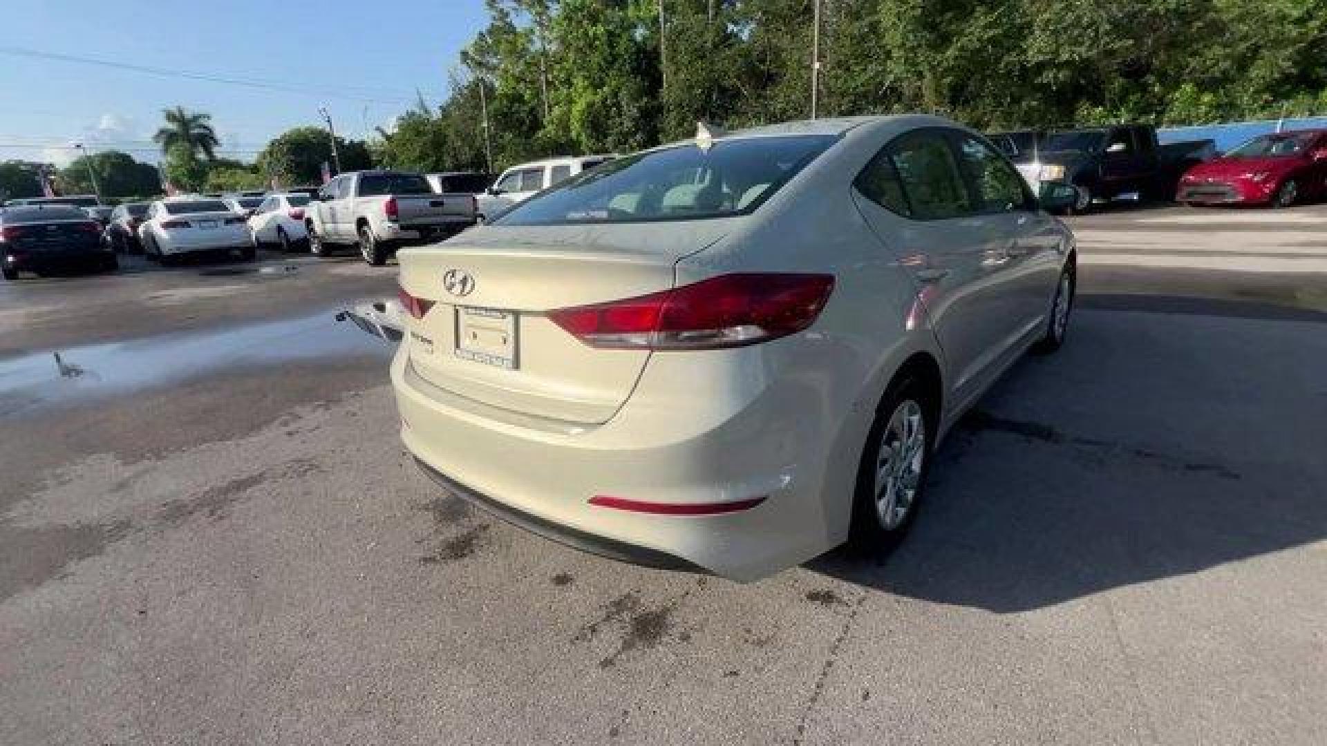 2017 Mineral Beige Pearl /Beige Hyundai Elantra SE (KMHD74LF2HU) with an 4 2.0 L engine, Automatic transmission, located at 27610 S Dixie Hwy, Homestead, FL, 33032, (305) 749-2348, 25.510241, -80.438301 - IIHS Top Safety Pick+, Top Safety Pick+. Delivers 38 Highway MPG and 29 City MPG! This Hyundai Elantra delivers a Regular Unleaded I-4 2.0 L/122 engine powering this Automatic transmission. MINERAL BEIGE PEARL, BEIGE, PREMIUM CLOTH SEAT TRIM, Window Grid Antenna.*This Hyundai Elantra Comes Equipped - Photo#4
